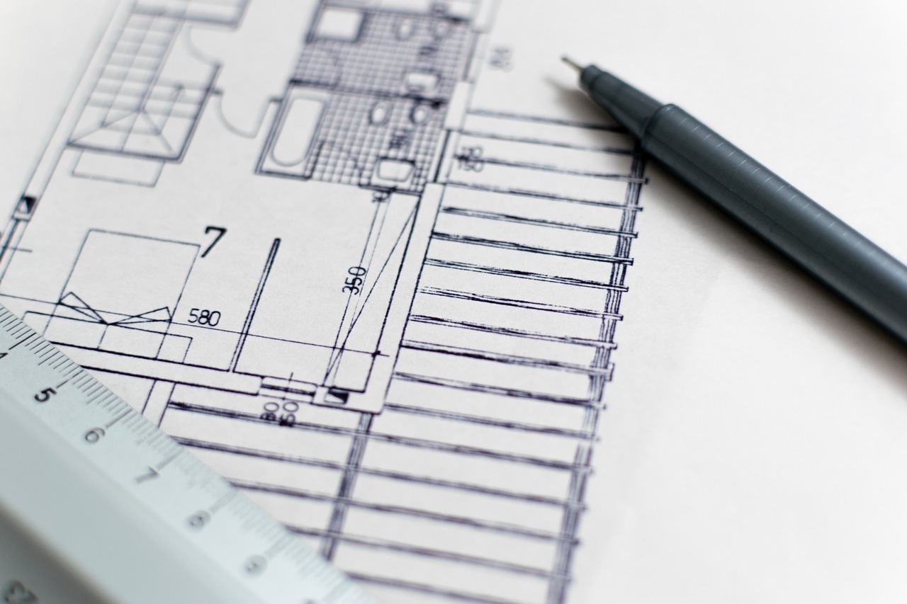 Architectural floor plan blueprint with drafting tools